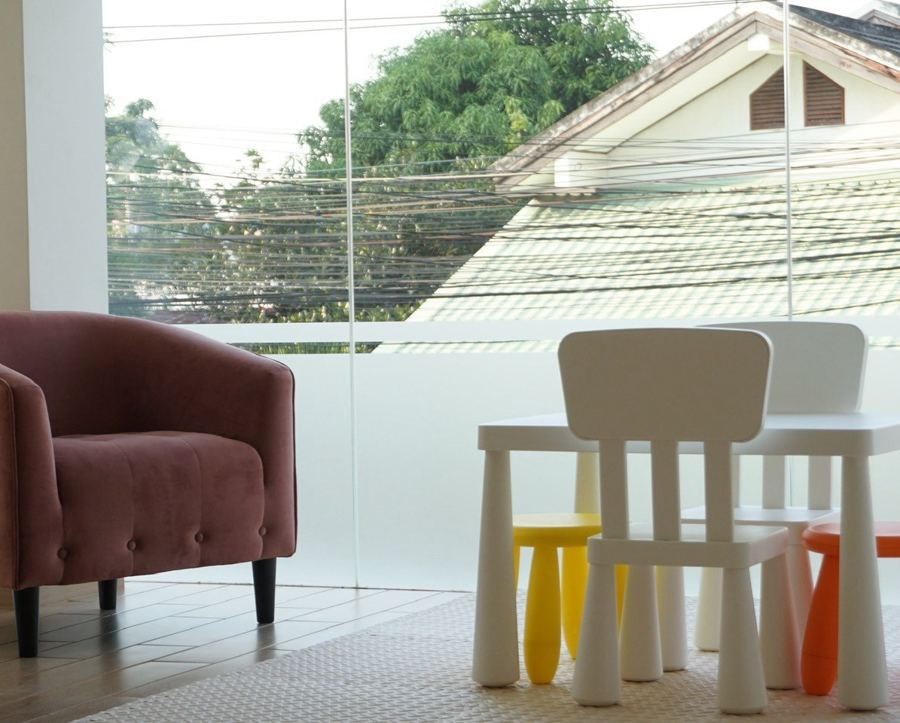 Waiting lounge with armchairs and kids table